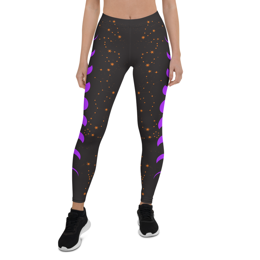 Ladies celestial leggings with orange stars and purple moon phases – cosmic design by Haunt Shirts